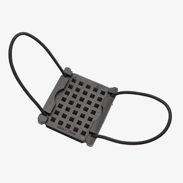 Black plastic weight fixing plate face mask holder with grid pattern and adjustable elastic straps in back view