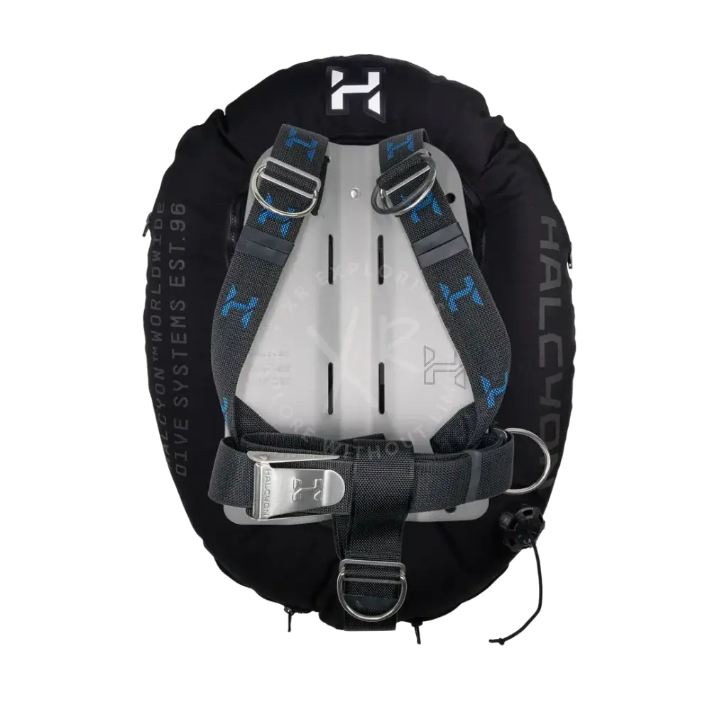 Black and white halcyon dive buoyancy compensator with blue logo accents on straps in wing and backplate system